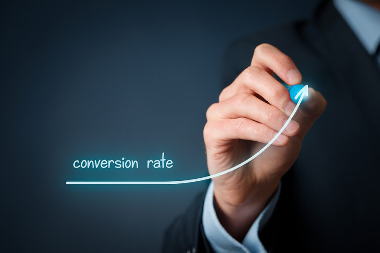 Businessperson draws growing graph of rising conversion rate.