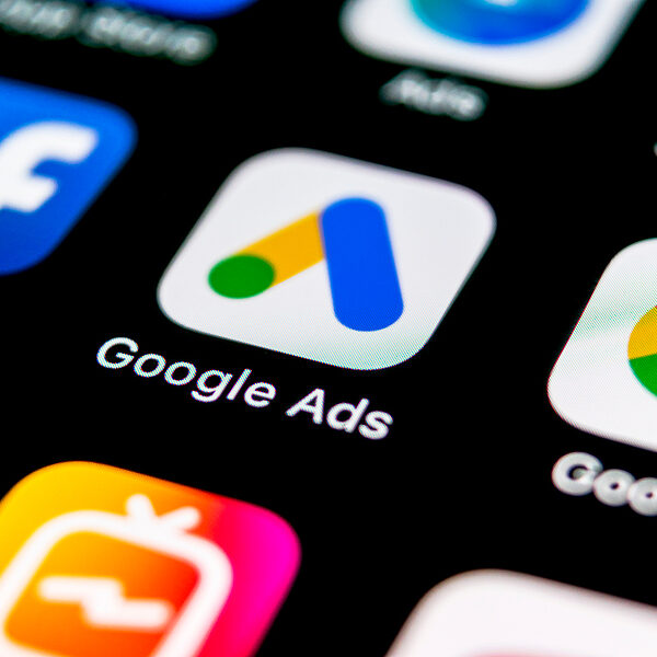 Close-up of a smartphone screen showing app icons for Facebook, Google Ads, Google, and other social/marketing apps.