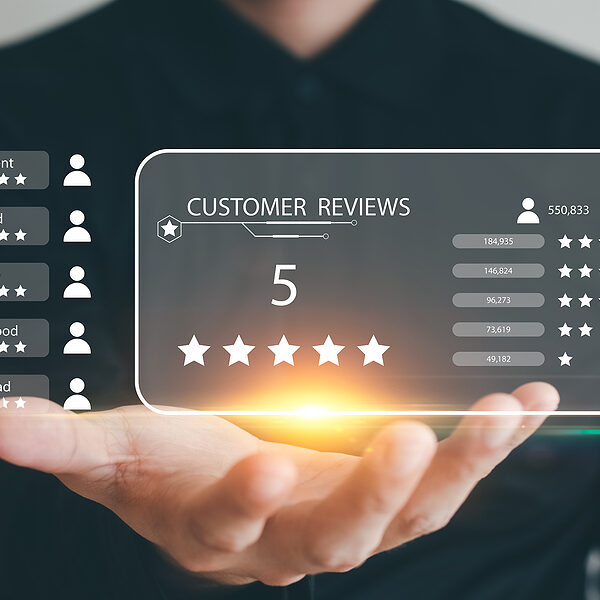 5-star customer review rating displayed on a holographic screen held above an open hand